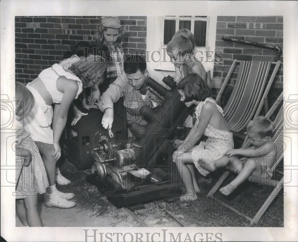 1952 Press Photo Dr. George Stump fixing engine