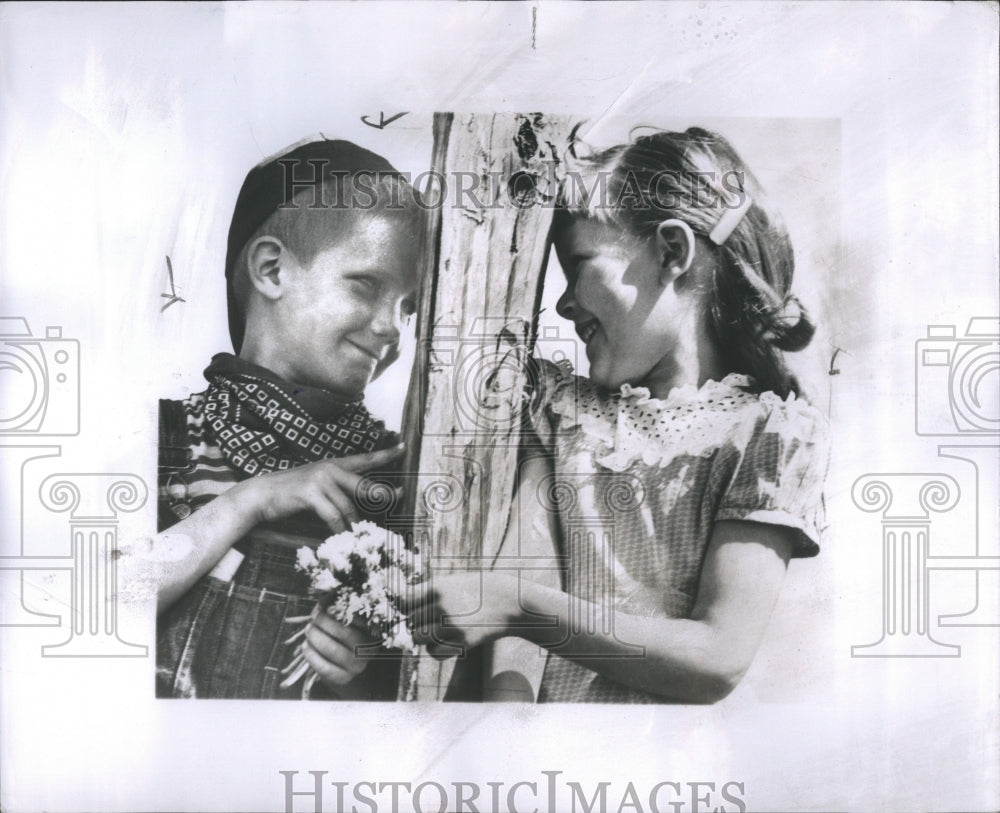 1956 Press Photo Spring Children Spring Flowers Winter