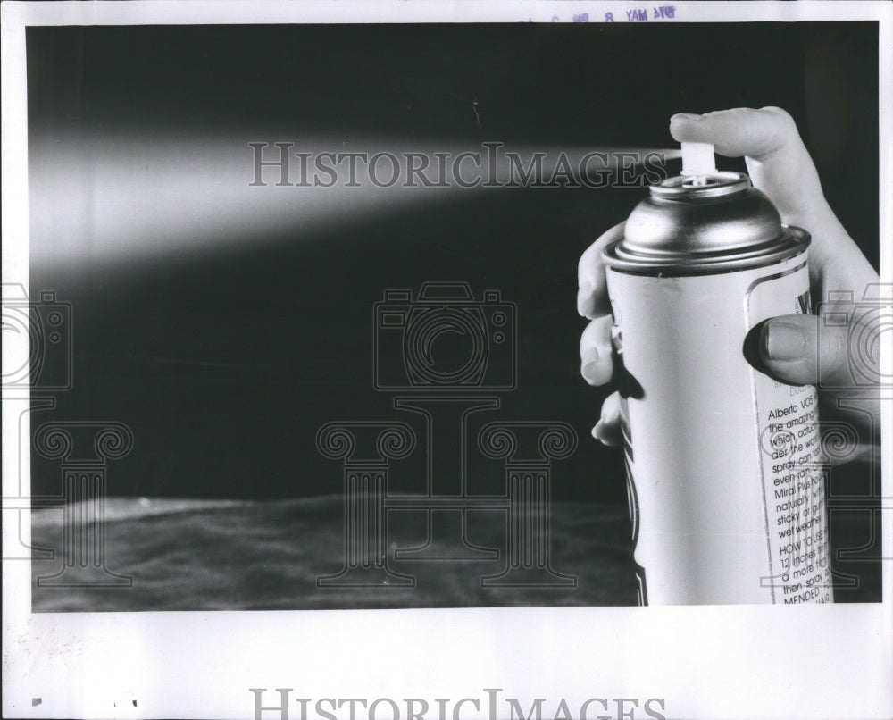 1974 Press Photo Bottle Hand Sparay