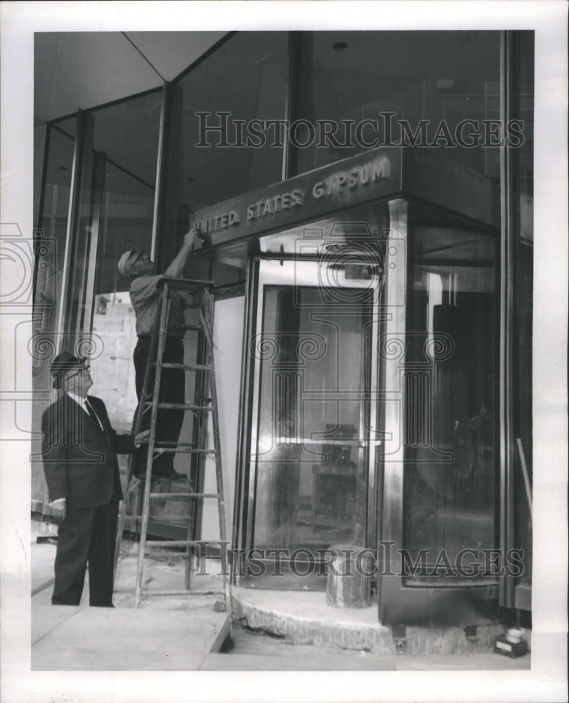 1963 Press Photo Workman puts finishing touches