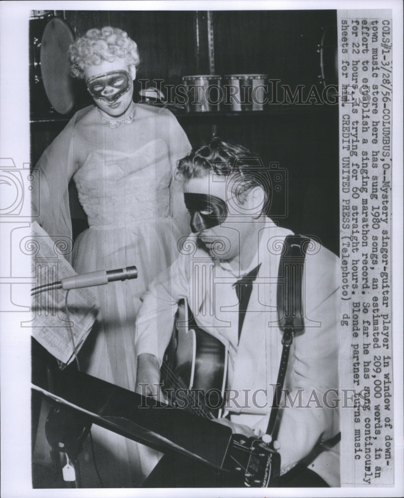 1956 Press Photo Downtown Music Store Mystery Singer