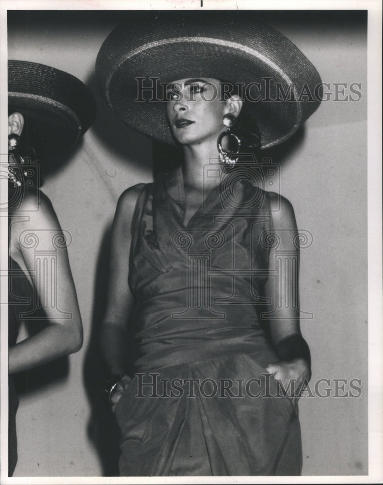 1988 Press Photo Women Blue Wrapped Blouse Bybios Hats