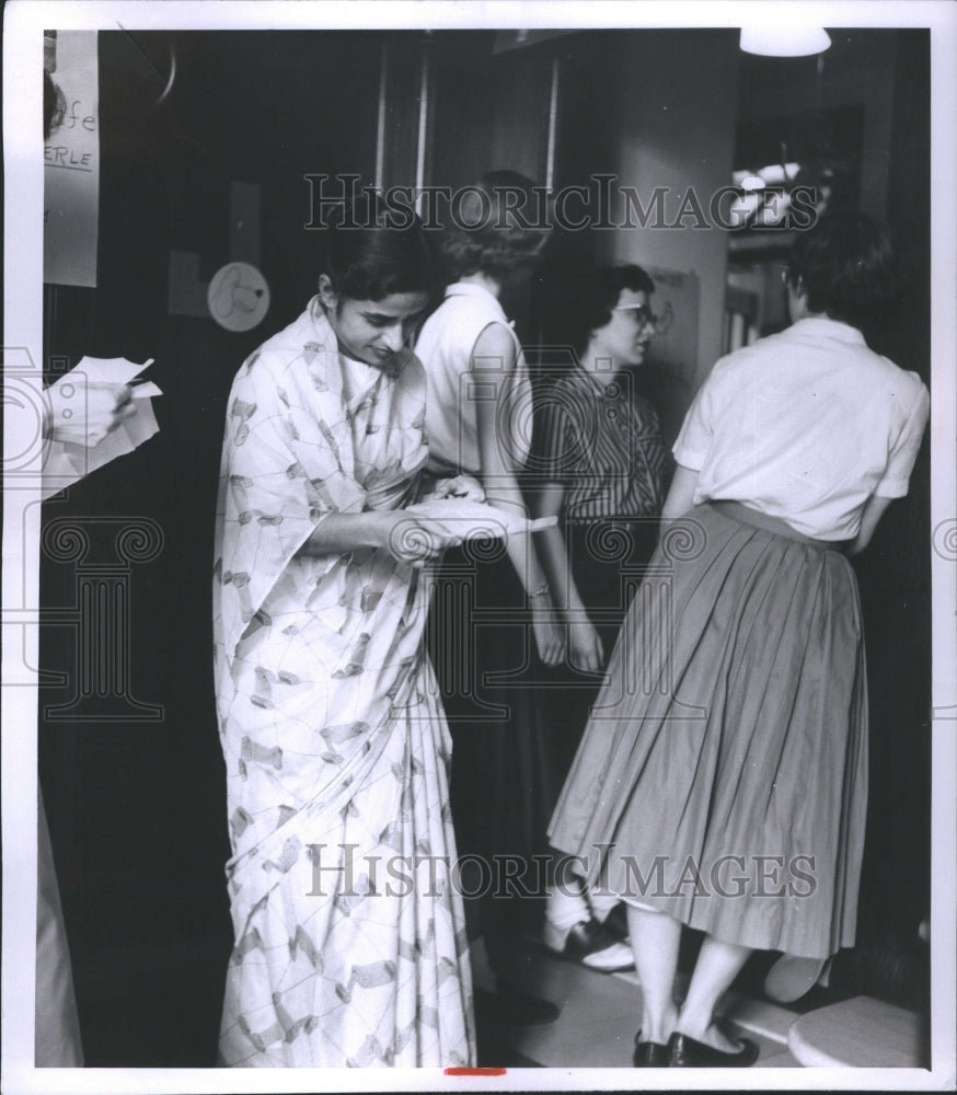 1957 Press Photo Foreign College Student Reads Letter