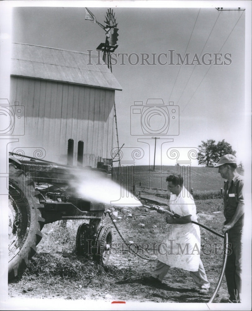 1954 Press Photo Davisburg Fireman Hose Michigan City