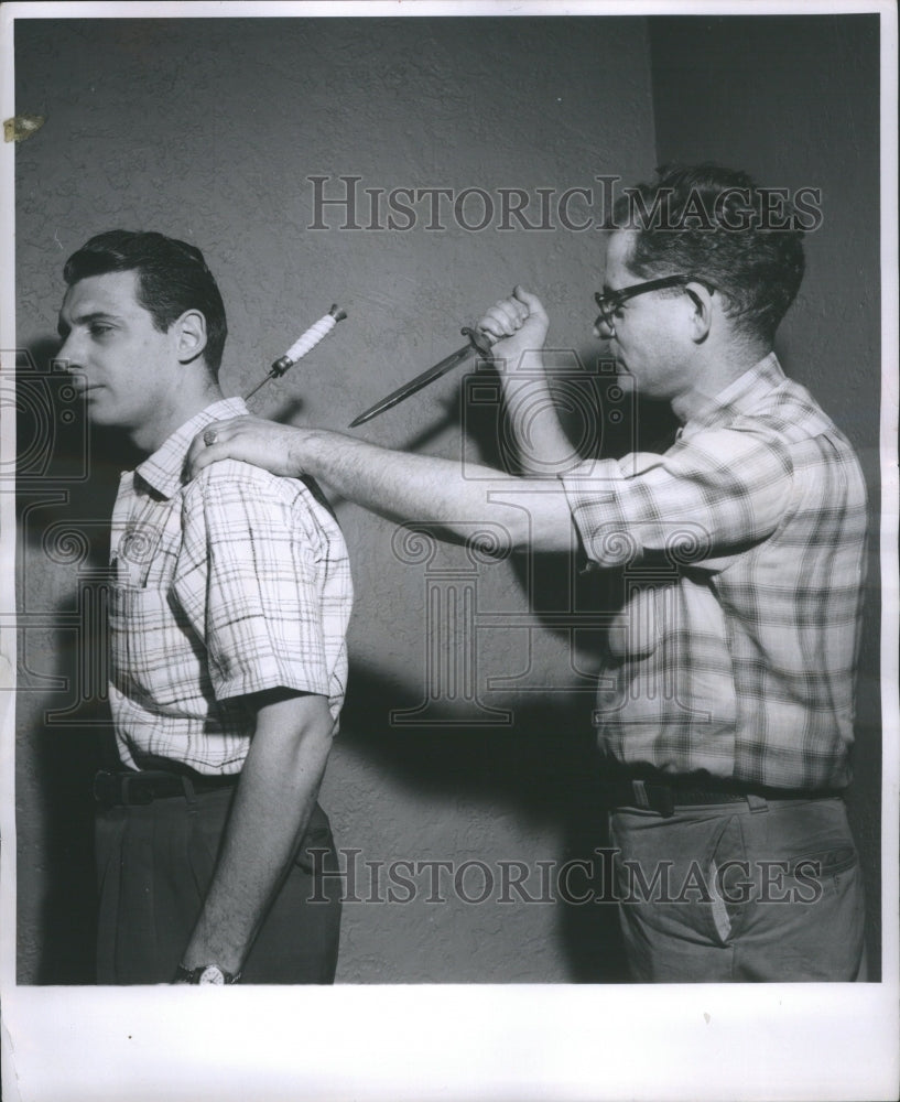 1956 Press Photo TV Stabbing Murder Motion Real Knife