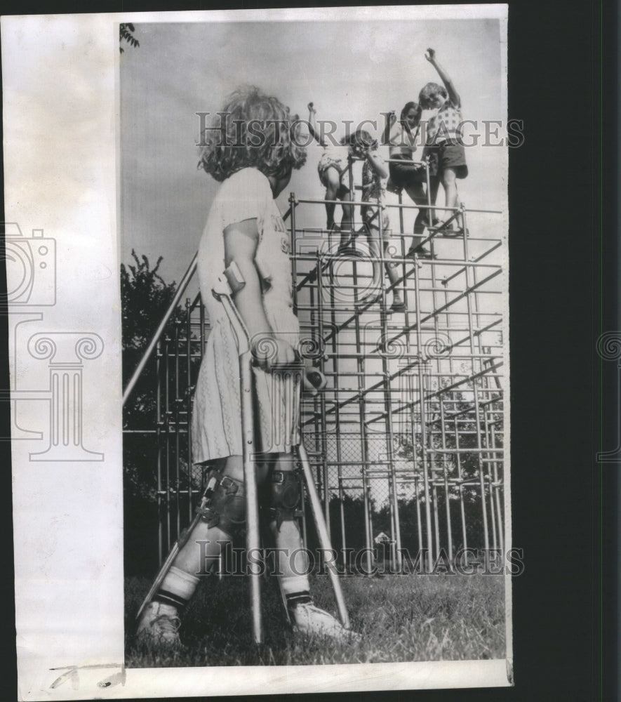 1956 Press Photo Childern Climbing