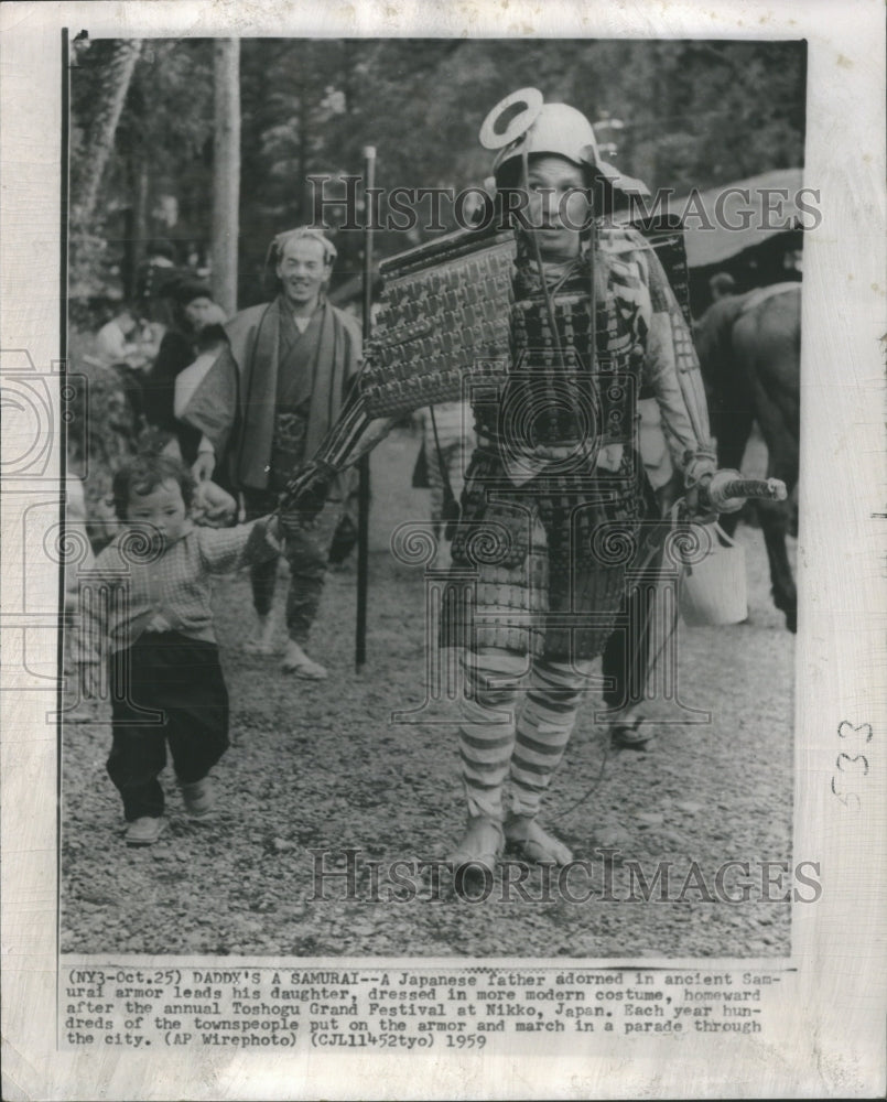 1959 Press Photo Man Dressed In Ancient Samurai Armor