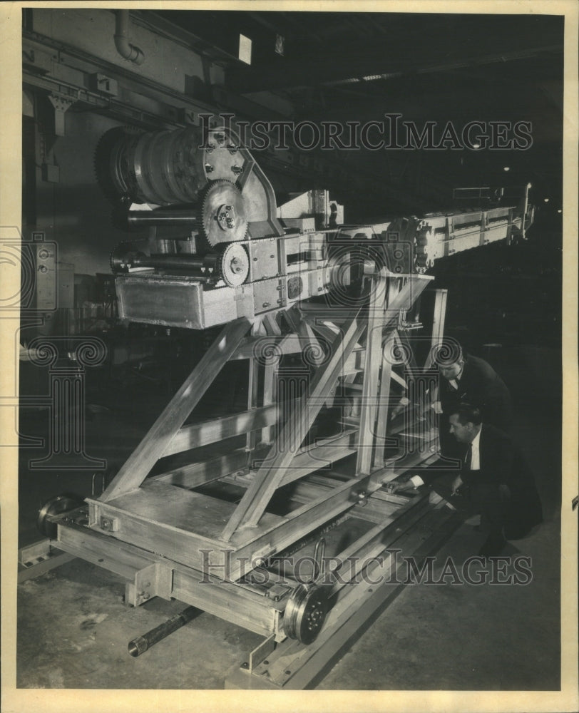 1958 Press Photo Railroad Track Machine Materials Water