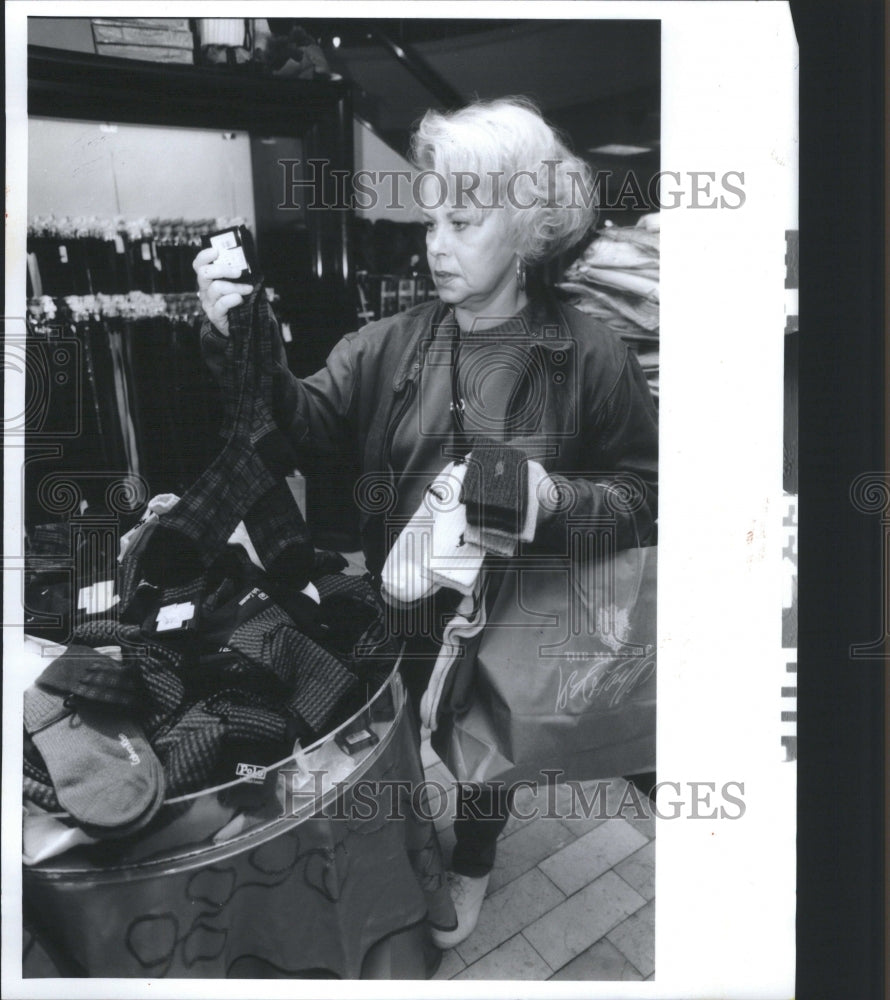 1993 Press Photo Sandra Pollak shopping for socks