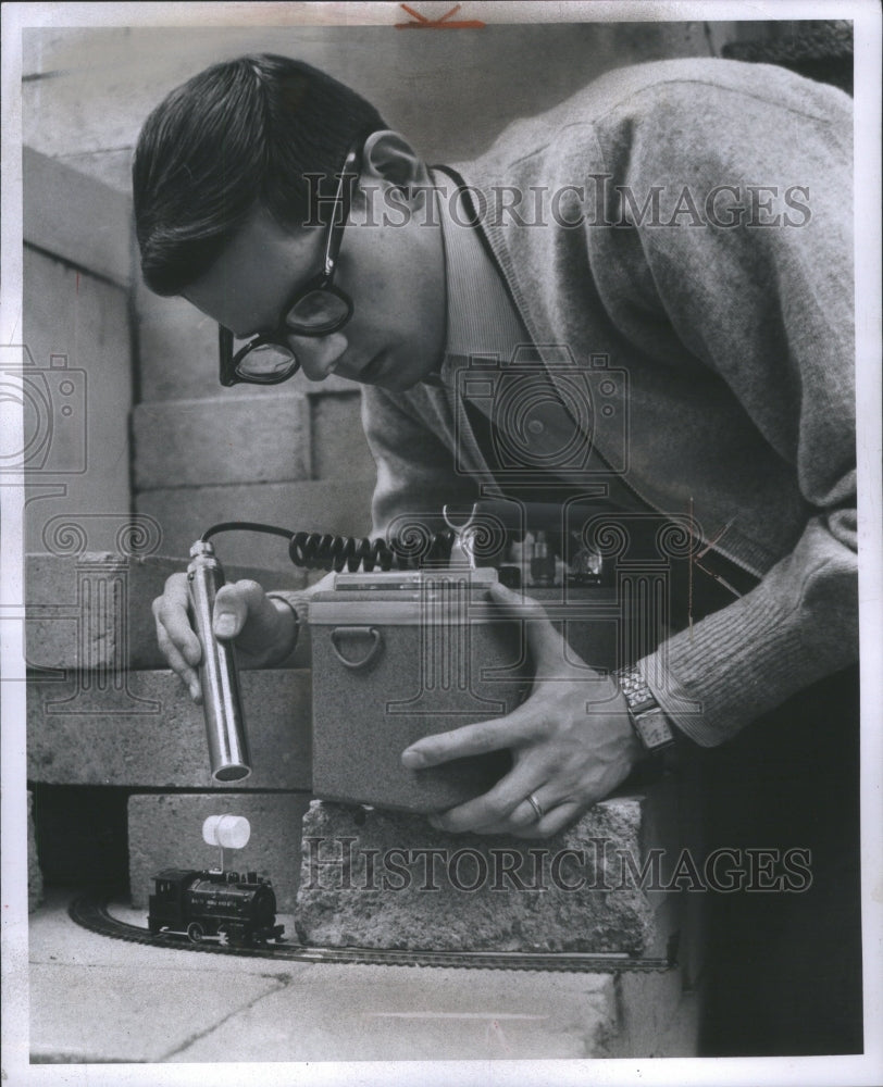 1960 Press Photo Graduate Paul Treado Level Engine Beam