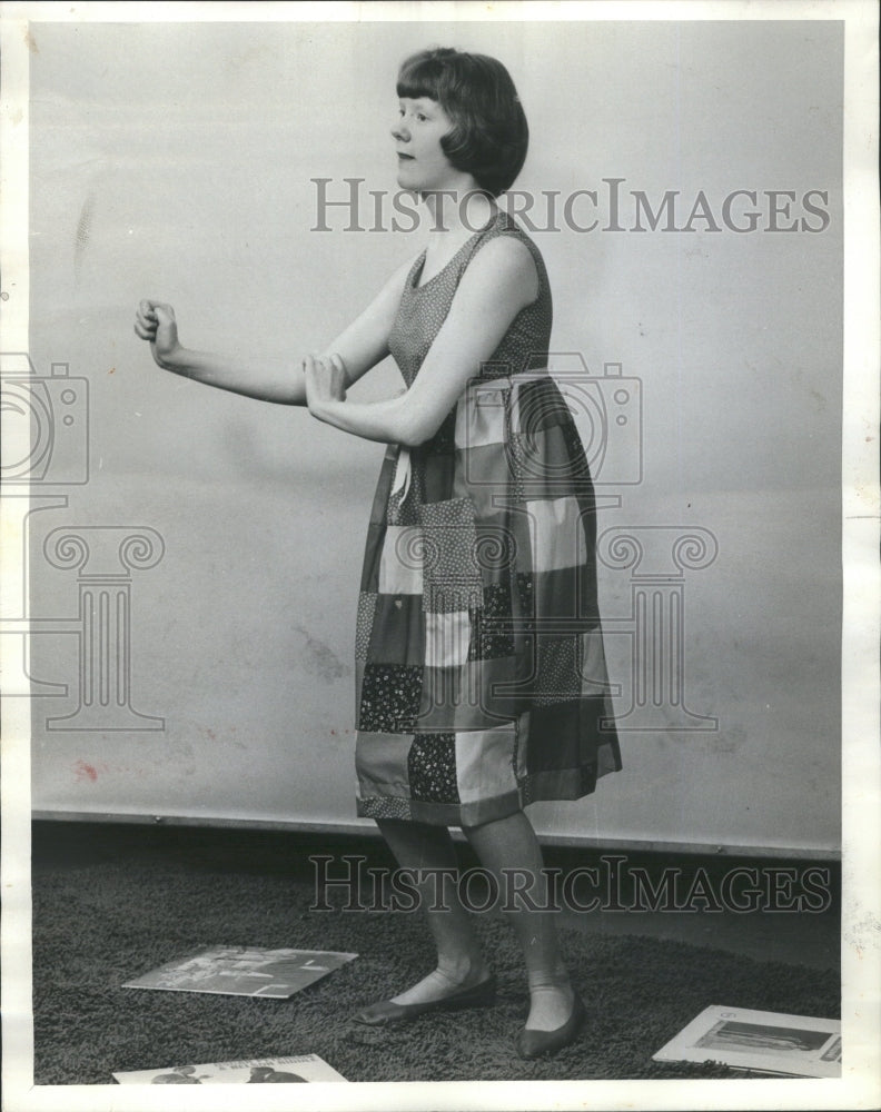 1965 Press Photo Marthi Swim Monkey Bright Dress