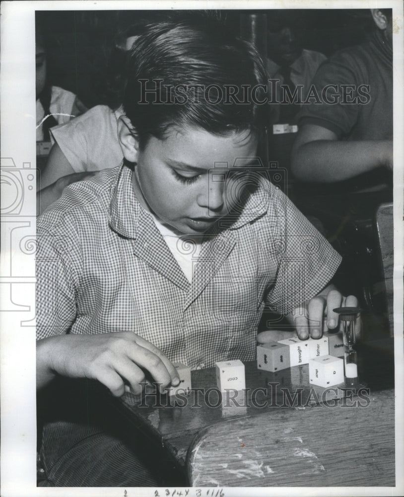 1961 Press Photo Michael Crimmins Educational Game