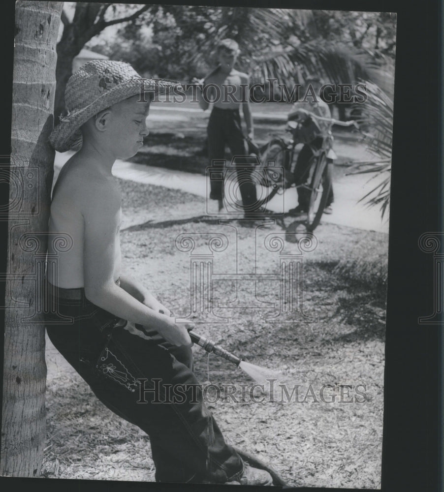 1951 Press Photo Playmate Ball GAme Herbis Lawn