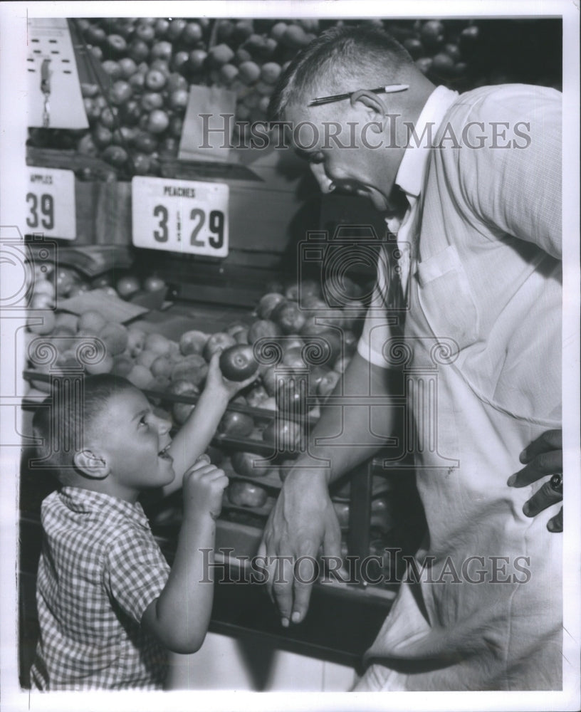 1957 Press Photo Freddie Homel What To Buy With Nickel