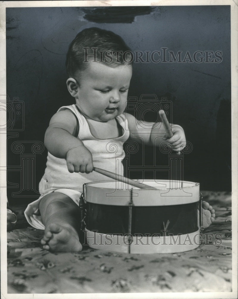 1947 Press Photo Baby Playing With Drum