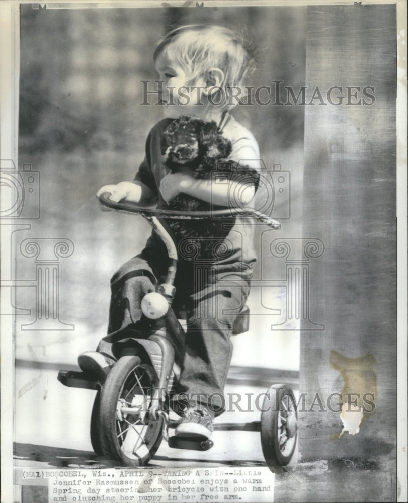 1974 Child Rides Tricycle With Puppy - Historic Images