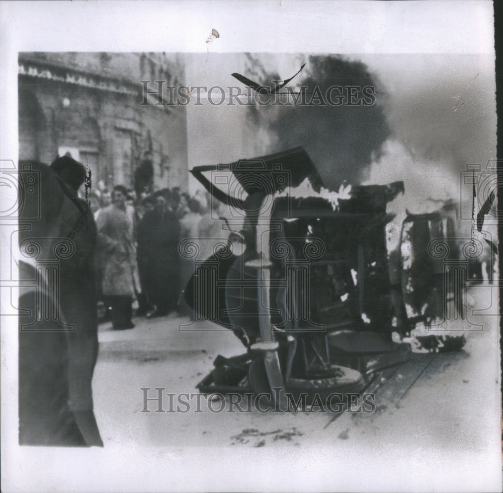 1953 Press Photo Protestors Riot Set Fire To Police Car