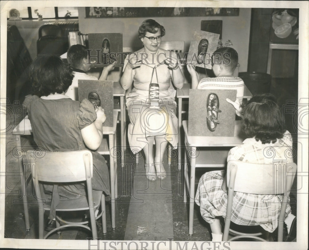 1956 table is a form of furniture featurin  - Historic Images