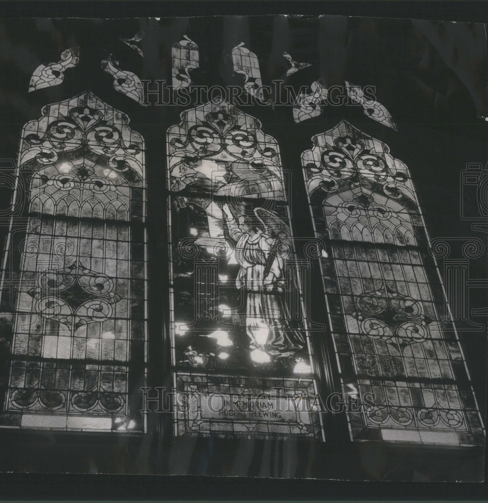 1954 Press Photo Holes in stained-glass church windows