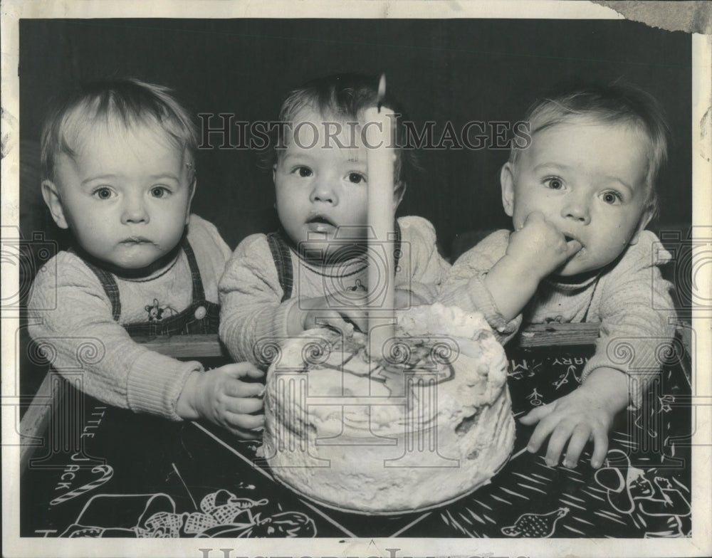 1960 Press Photo Triplets Who Were Born April 1st Cake