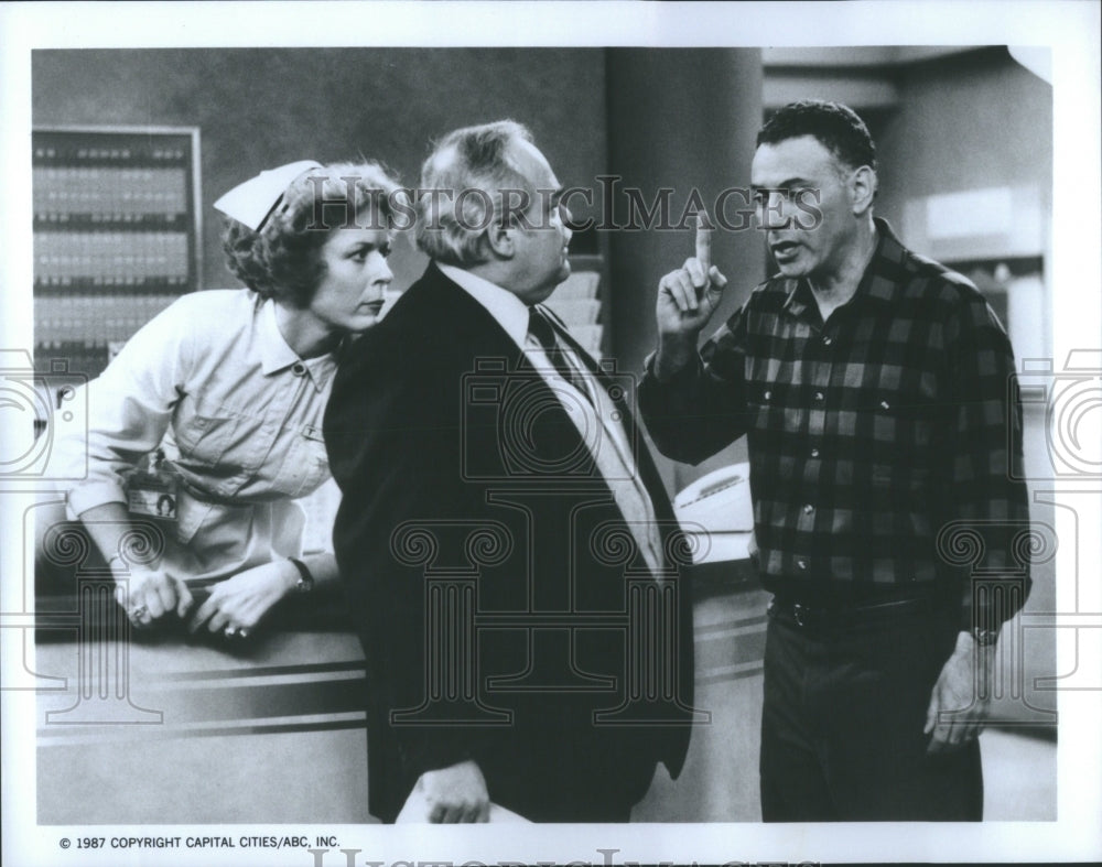 1987 Press Photo Alan Arkin Harry Wyatt Lockhart Caps