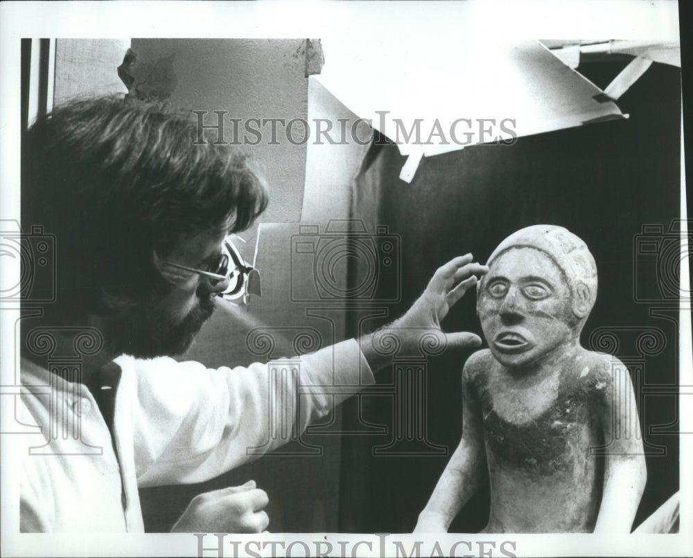 1972 Press Photo Producer Howard Campbell Examines Buri