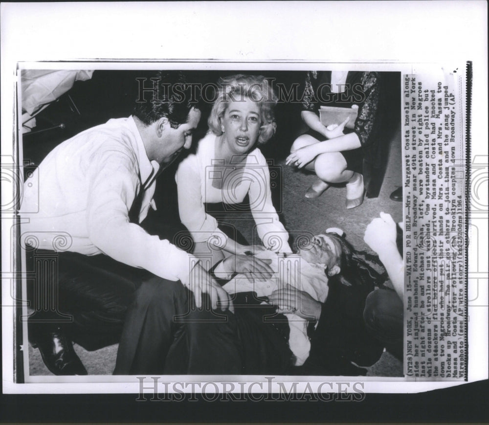 1964 Press Photo Waited Help Mrs Margaret Costa Kneels