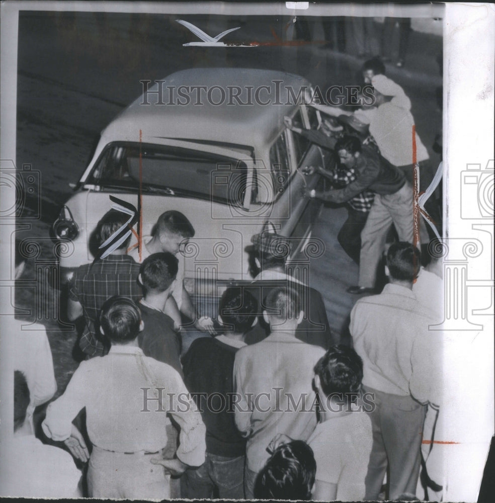 1956 Press Photo Rioting Mob Turns On Vehicle Driver