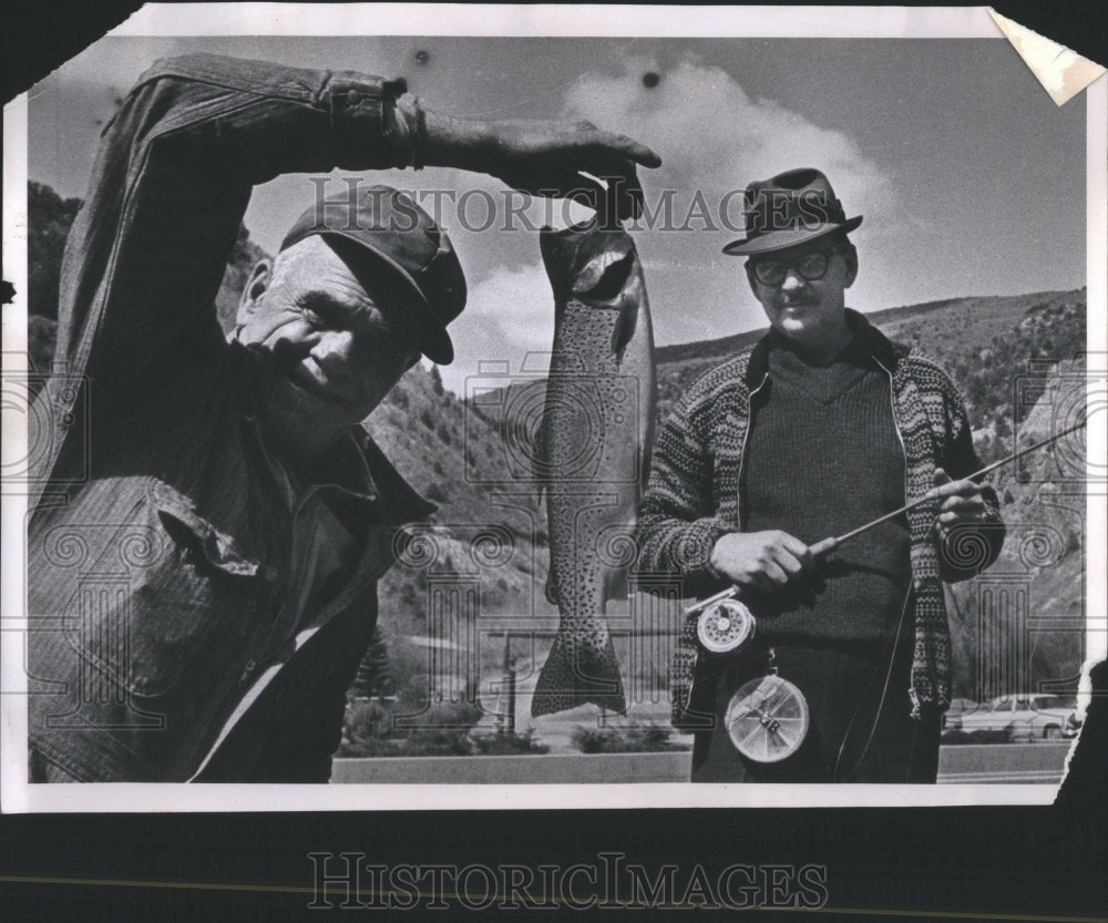 1963 Baker H Ray fishing - Historic Images