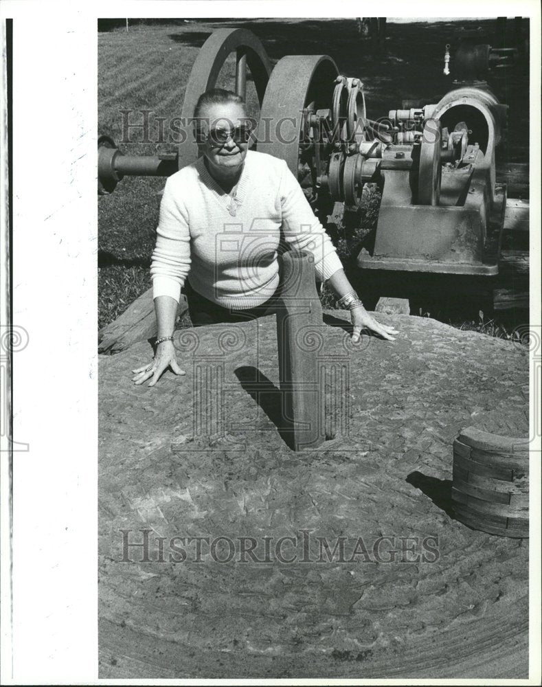 1981 May Whalen with stone cutting machine. - Historic Images