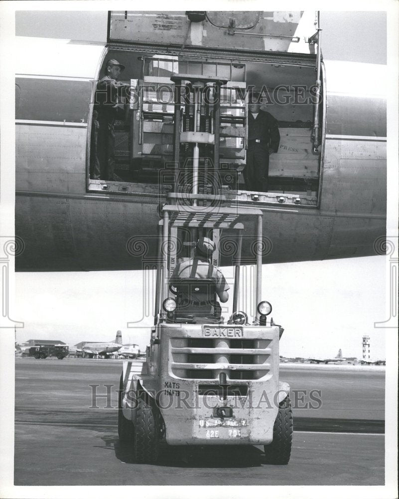 MATS Aircraft Unloading Cargo Hawaii - Historic Images