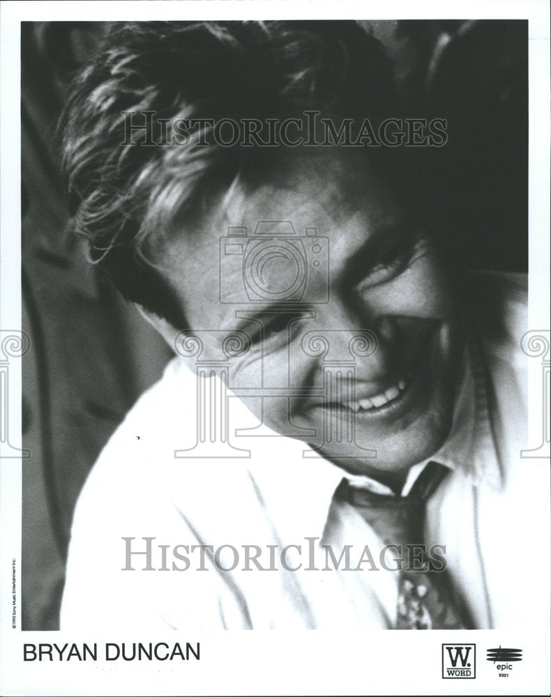 1993 Close-up caption of Bryan Duncan smile - Historic Images