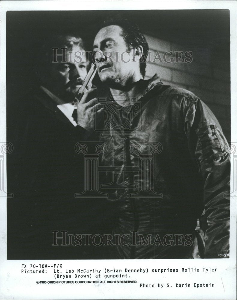 1986  F/X Brian Dennehy Bryan Brown Gun - Historic Images