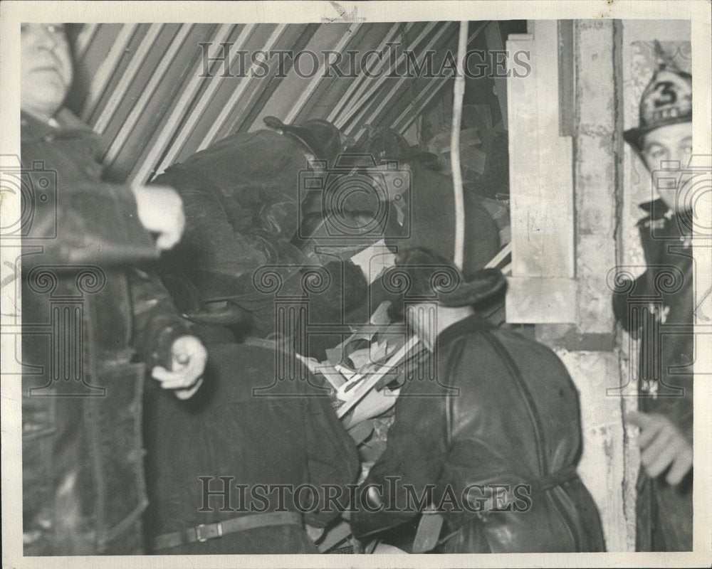 1948 Firemen work Feverishly Victim Risk - Historic Images