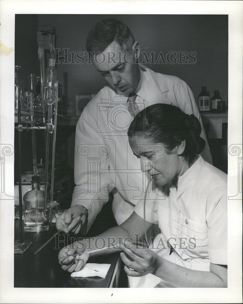 1957 Lab Tech Uses Scientific Instruments - Historic Images