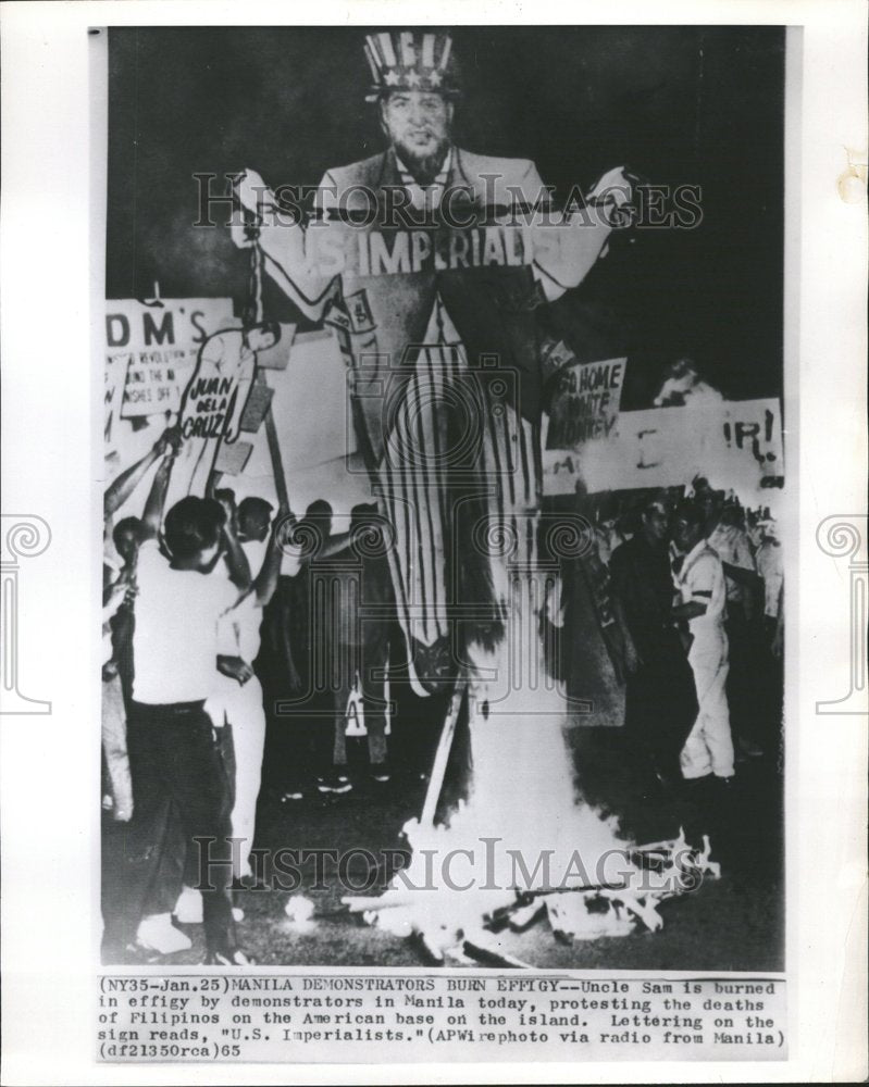 1955 Uncle Sam is burned in protest - Historic Images