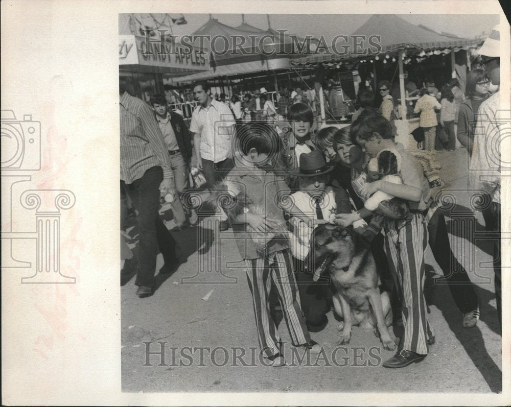 1972 Boys Pet Police Attack Dog At Fair - Historic Images