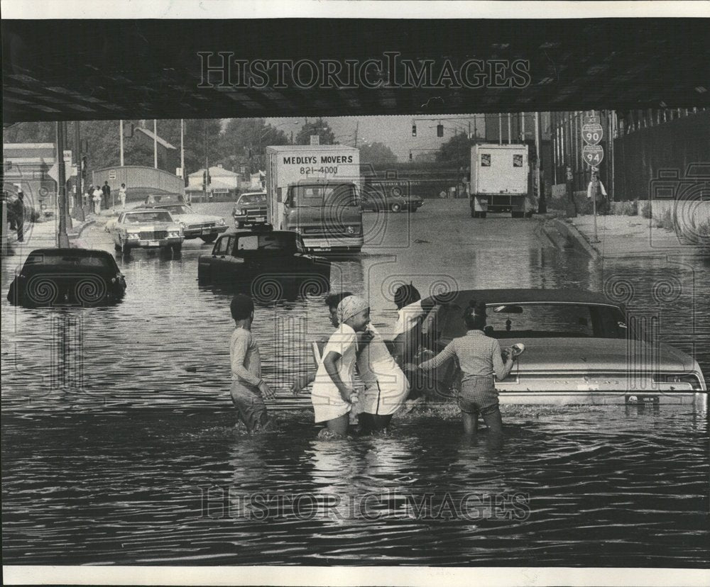 1975 Kids Federal Motorist Flooded Cars - Historic Images