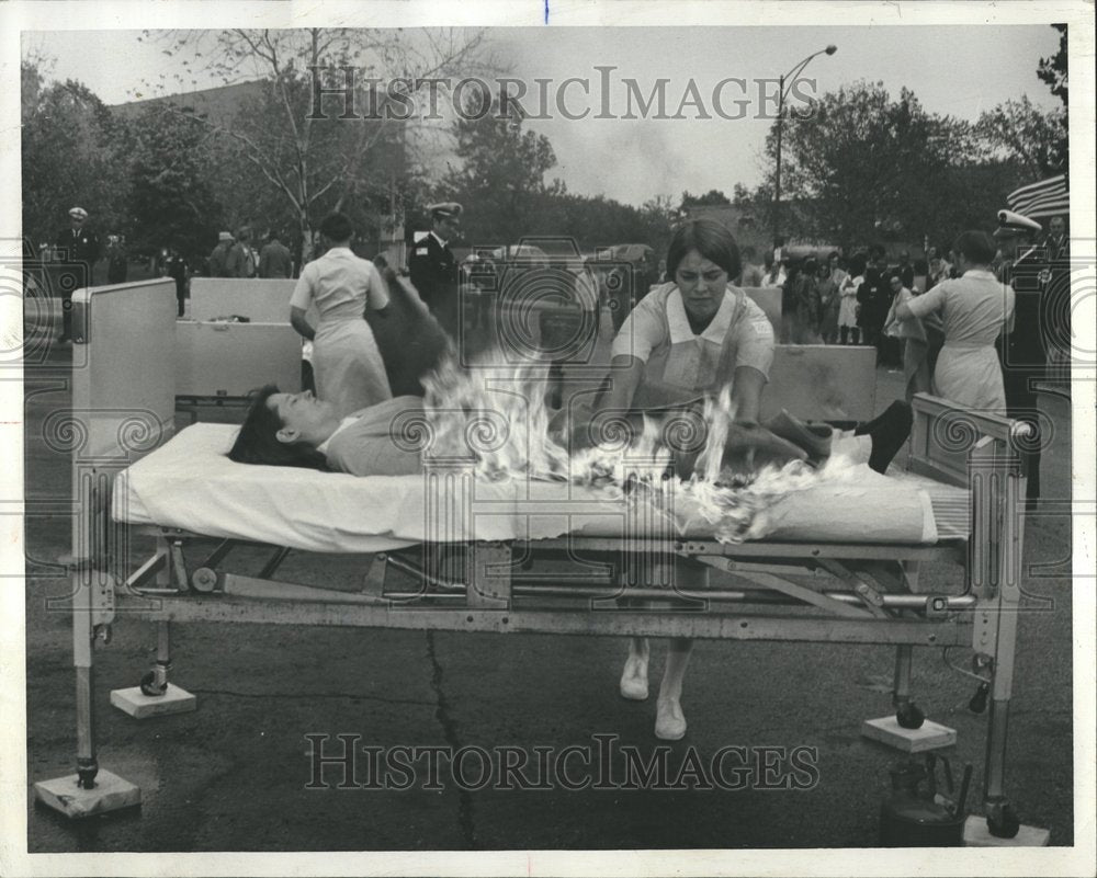 1972 Student nurse and patient burning demo - Historic Images