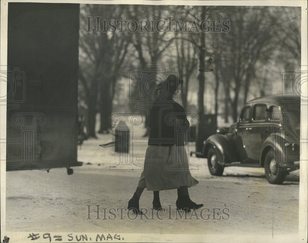 1940 Amish Woman & Child Walk Snowy Street - Historic Images