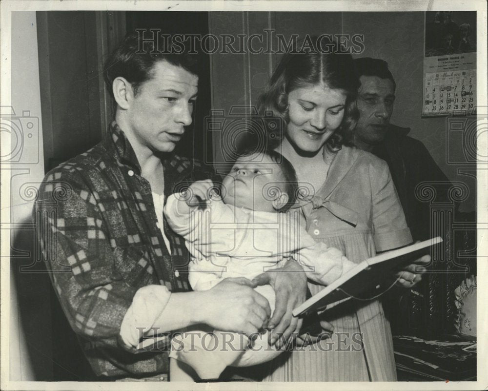 1957 Parents Of Murdered Child Hold Baby - Historic Images