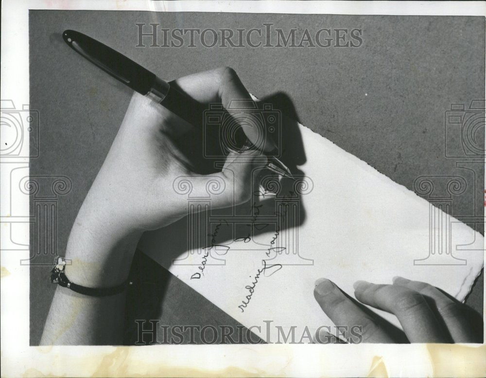 1955 Left Handed Woman Writes With Pen - Historic Images