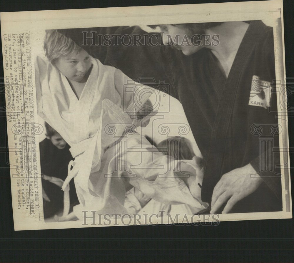 1973 Little Boy Karate Kicks His Teacher - Historic Images