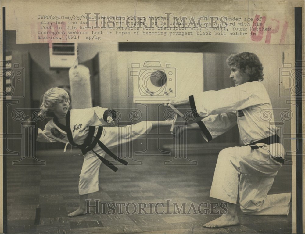 1976 Little Karate Boy Kick Breaks Board - Historic Images