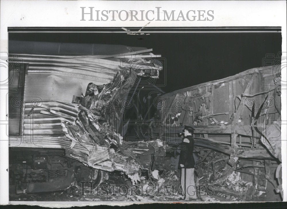 1957 Trooper Inspects Railroad Coach - Historic Images