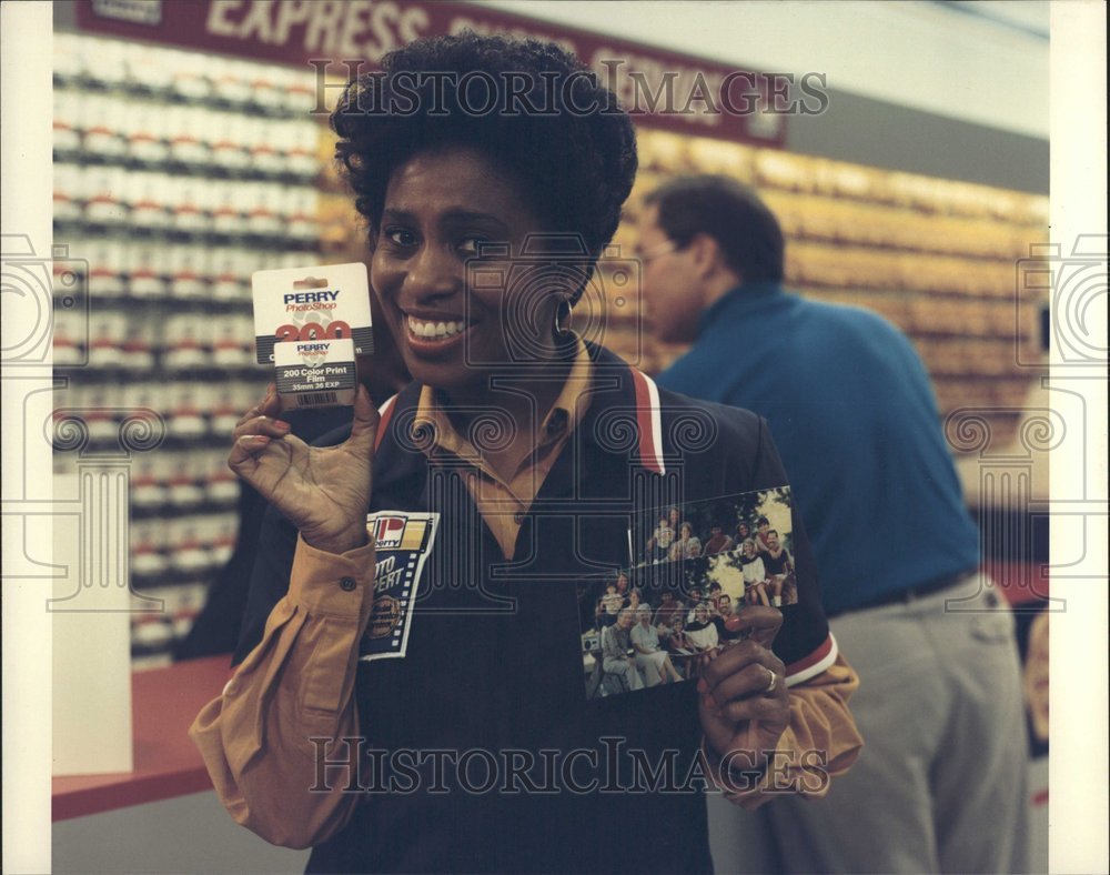 1990 Woman advertising for Perry Drug Store - Historic Images