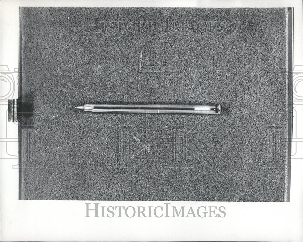 1975 Close-up caption of a ball point pen - Historic Images