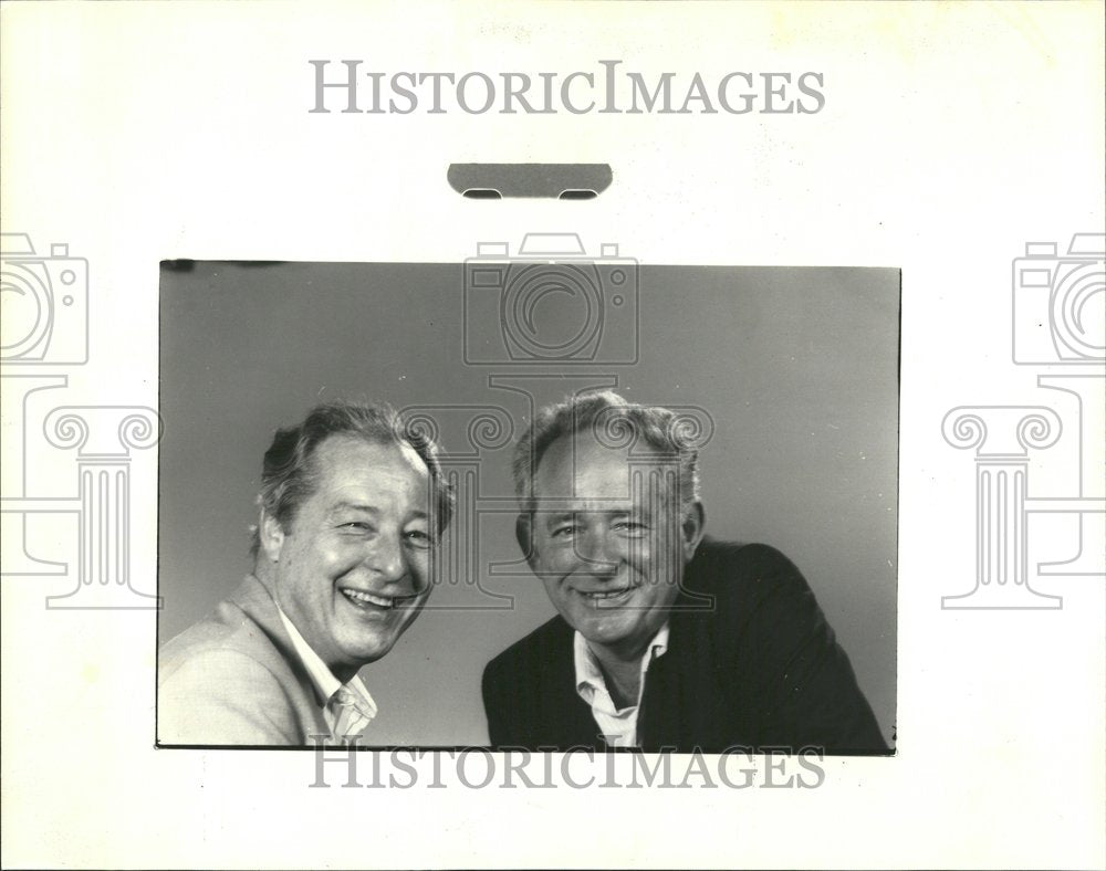 1987 Close-up caption of Staples &amp; Schaller - Historic Images