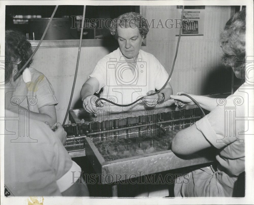 1953 Perfume Making Gold Leaf Bottles - Historic Images