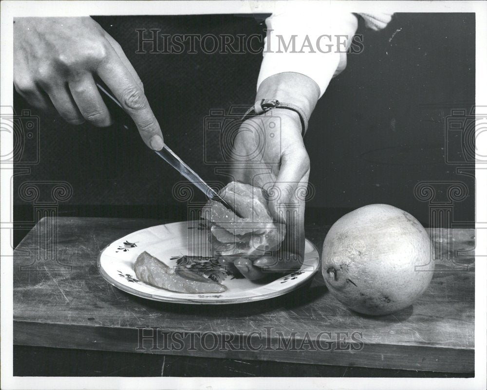 1968 Hands Cutting Sectioning Orange - Historic Images